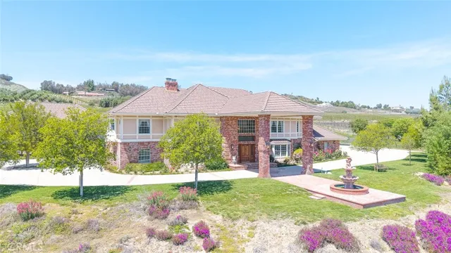 a view of swimming pool with a yard