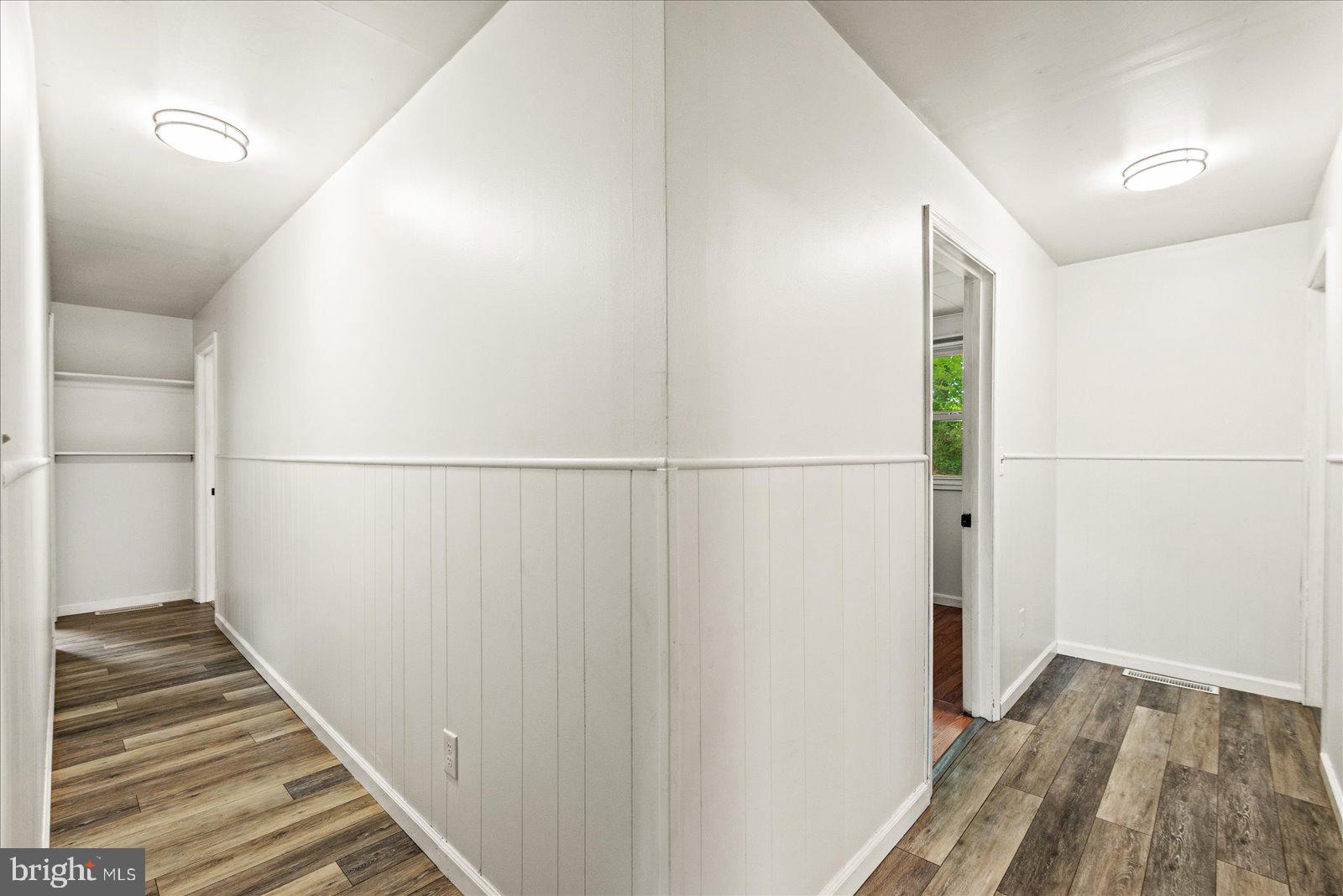 679 Resettlement Road Madison, VA 22727 - Photo 18 of 47 a view of a hallway with wooden floor and entryway