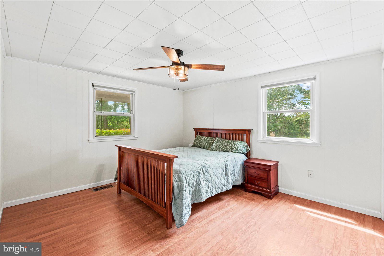 679 Resettlement Road Madison, VA 22727 - Photo 19 of 47 a bedroom with a bed and a window