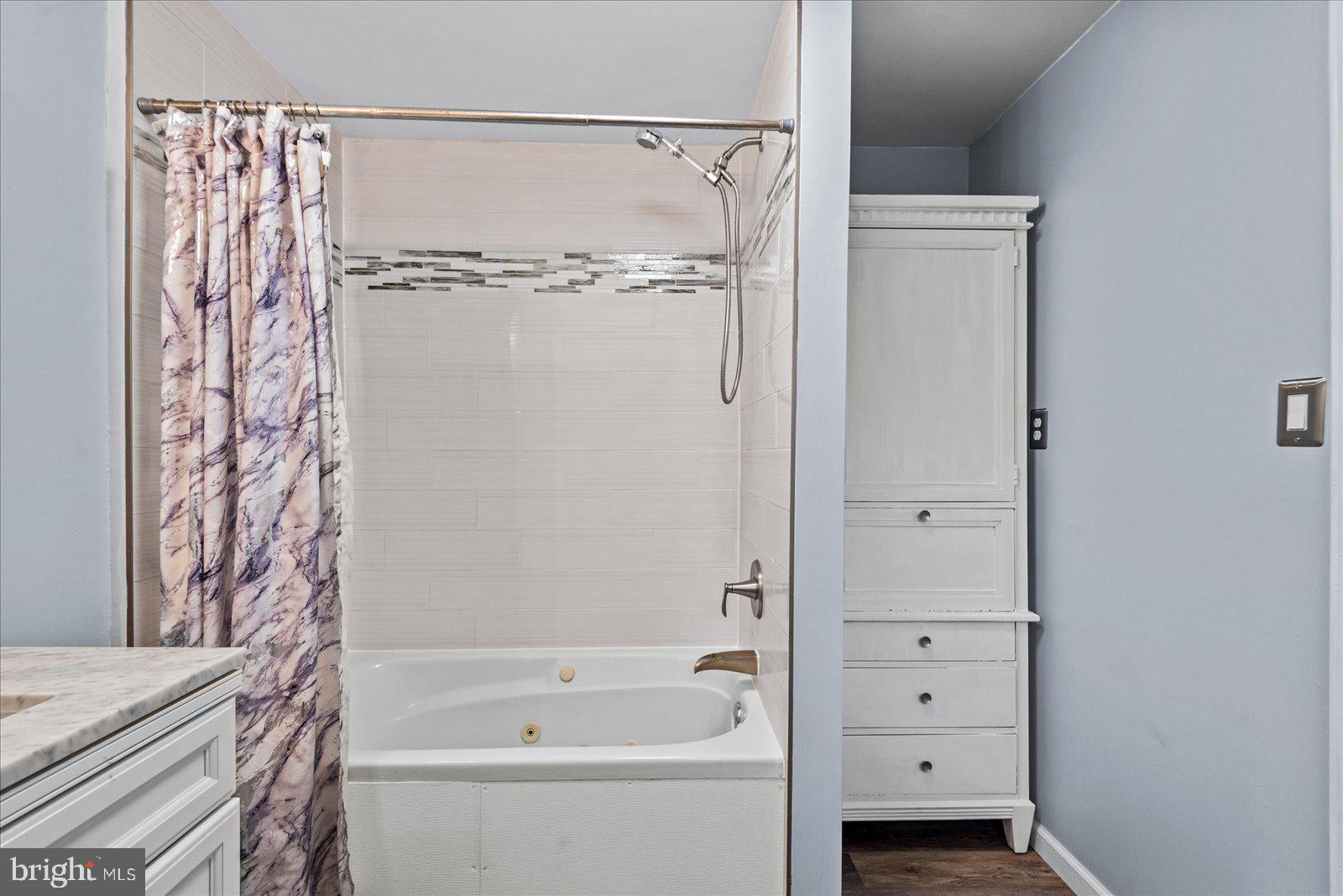 679 Resettlement Road Madison, VA 22727 - Photo 27 of 47 a bathroom with a bathtub and a shower
