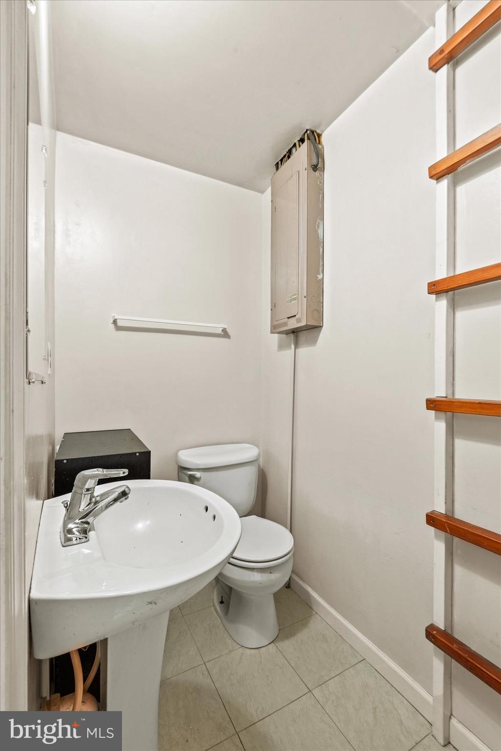 679 Resettlement Road Madison, VA 22727 - Photo 28 of 47 a bathroom with a toilet a sink and mirror
