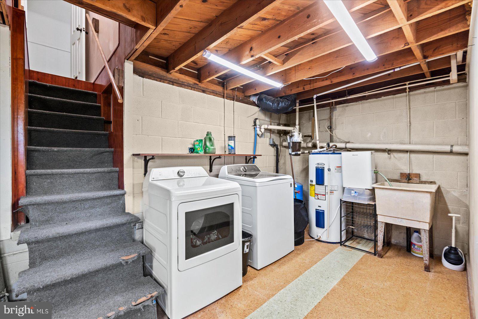 679 Resettlement Road Madison, VA 22727 - Photo 29 of 47 a view of storage and utility room with washer and dryer