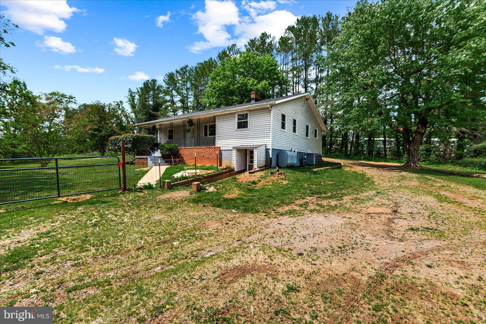 679 Resettlement Road Madison, VA 22727 - Photo 37 of 47 a view of a house with a yard