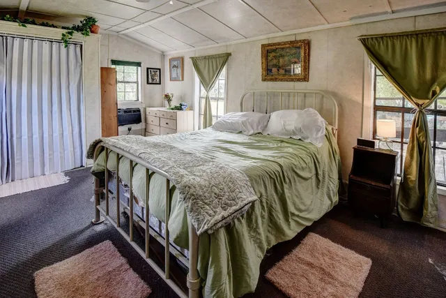 a view of swimming pool with a patio