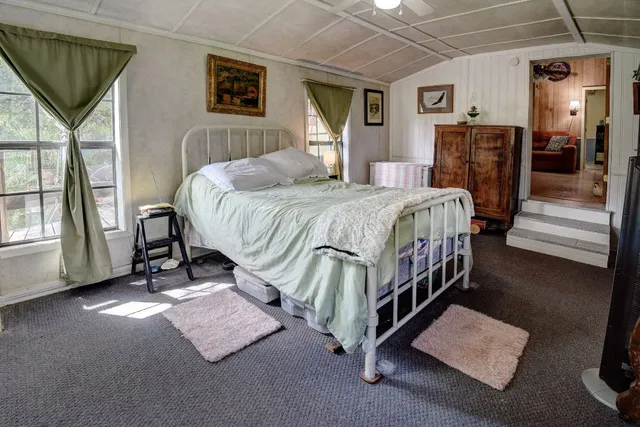 a backyard of a house with lots of green space