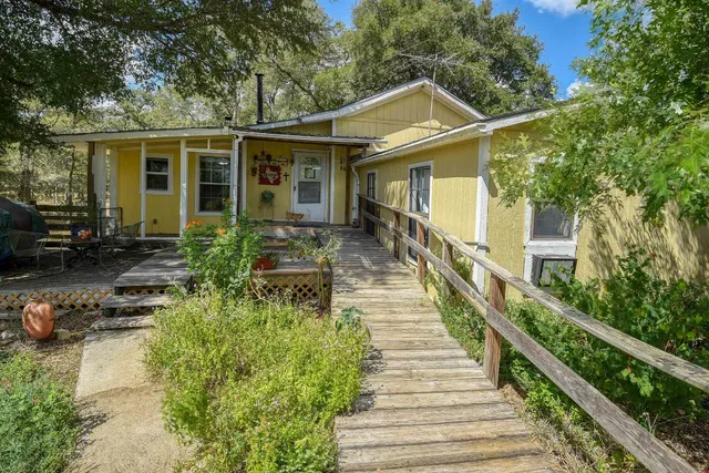 a view of a door with wooden floor