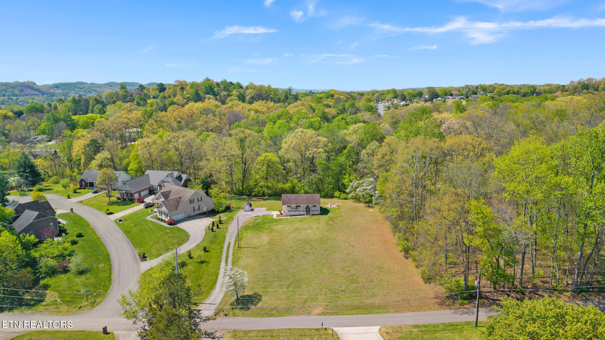 8001 Helen Drive Powell, TN 37849 - Photo 9 of 47 dji_20260409122822_0876_d_1