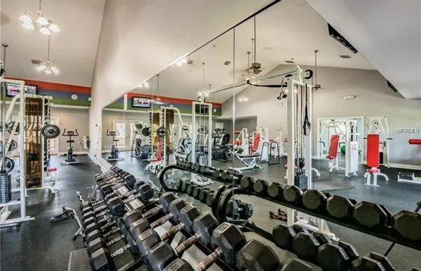 a room with lots of gym equipment