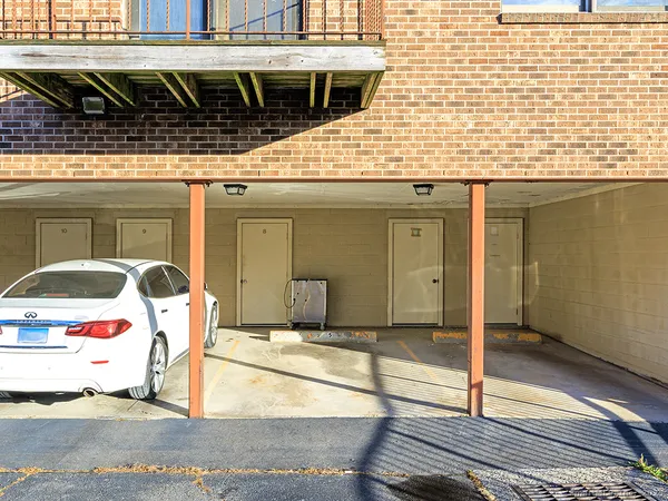 a car parked on the side of a building