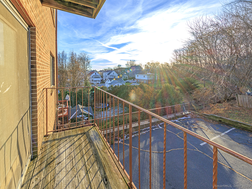 50 Long Street, Unit 5 New Britain, CT 06051 - Photo 6 of 16 a view of balcony and wooden floor