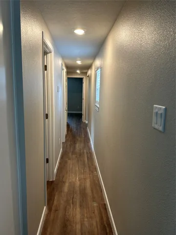 a view of hallway with stairs