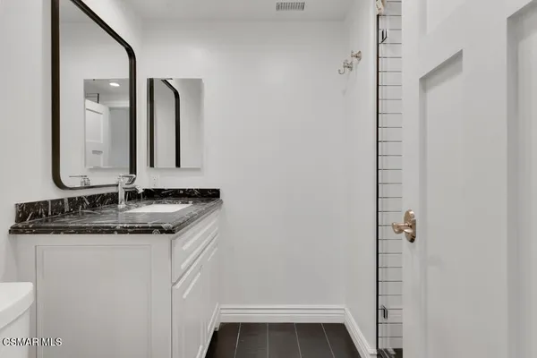 a living room with a wooden floor