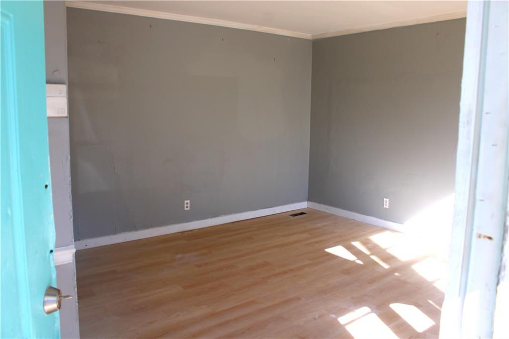 1189 Hartley Street Macon, GA 31206 - Photo 2 of 9 a view of an empty room