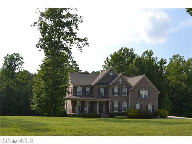 7892 Newhaven Drive Oak Ridge, NC 27310 - Photo 1 of 16 Exterior Front.
