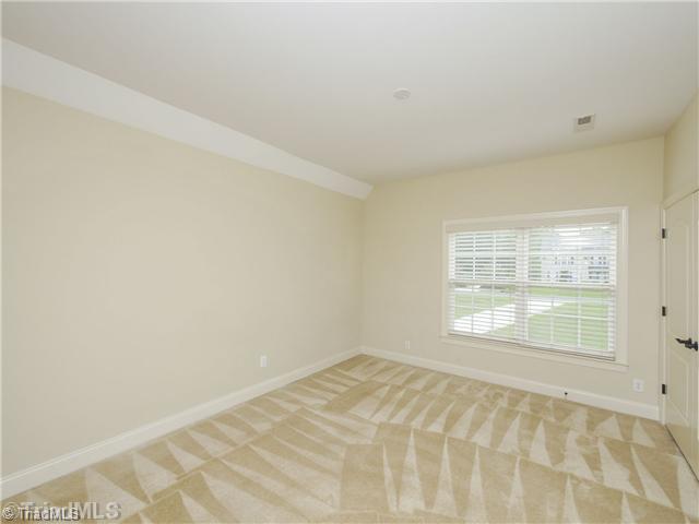 7892 Newhaven Drive Oak Ridge, NC 27310 - Photo 13 of 16 1st Bedroom.
