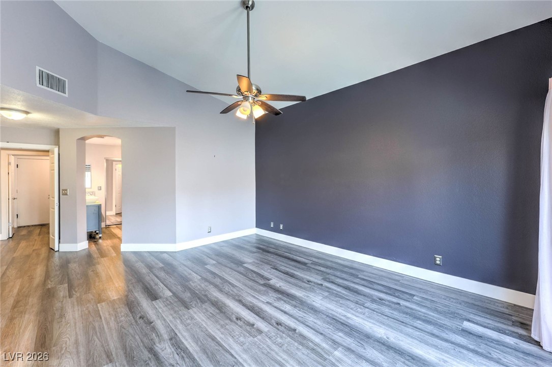 9405 Crosspointe Avenue Las Vegas, NV 89117 - Photo 11 of 37 Primary Downstairs Bedroom w/ Entry to backyard