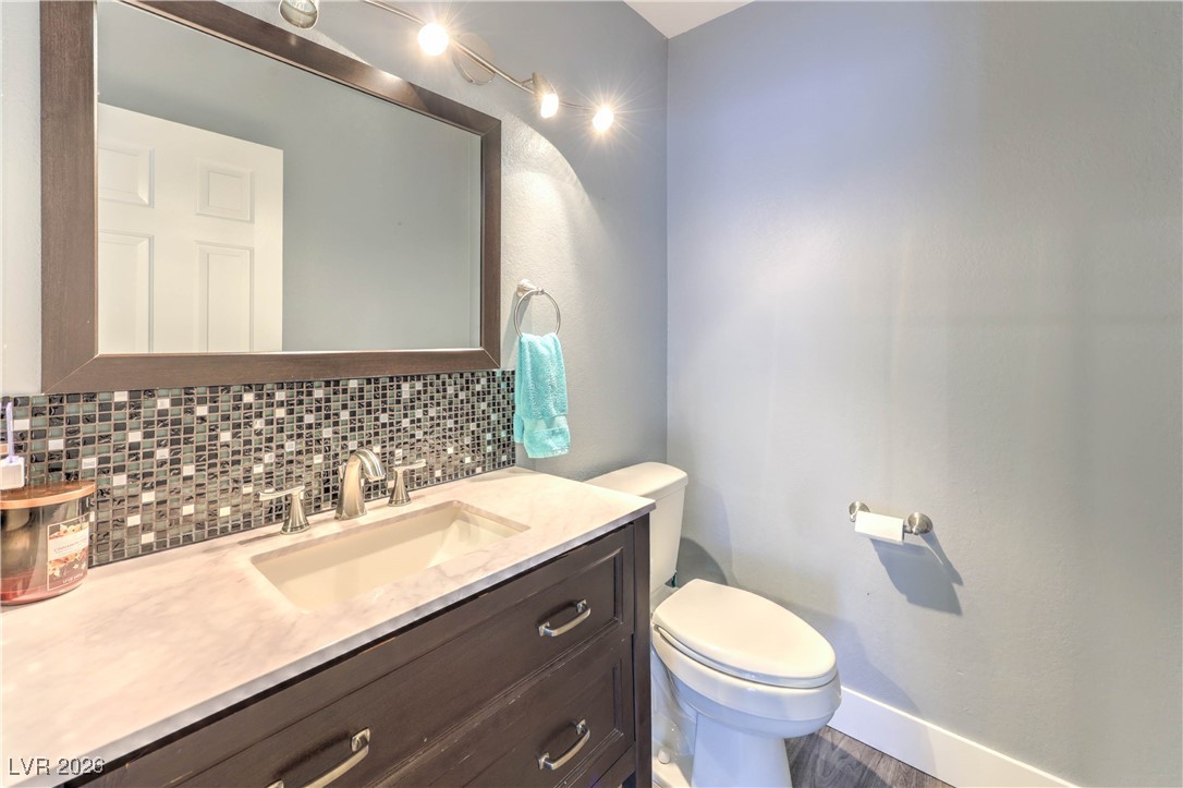 9405 Crosspointe Avenue Las Vegas, NV 89117 - Photo 13 of 37 Downstairs Bathroom w/ Upgraded Single sink Vanity