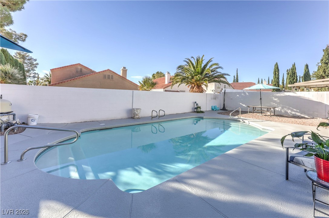 9405 Crosspointe Avenue Las Vegas, NV 89117 - Photo 27 of 37 Solar Heated Pool w/ newly painted deck