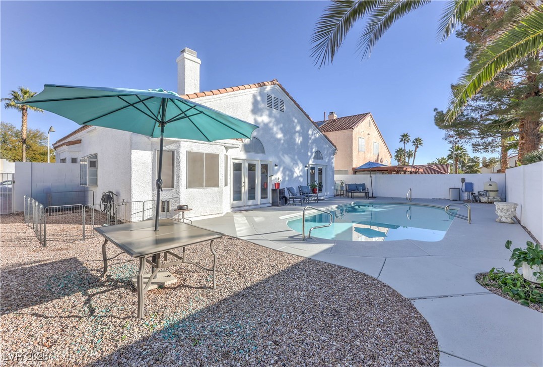 9405 Crosspointe Avenue Las Vegas, NV 89117 - Photo 28 of 37 Solar Heated Pool w/ newly painted deck