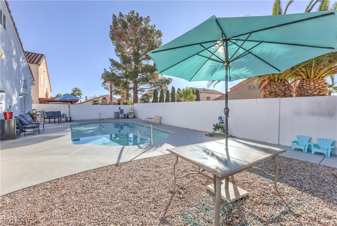9405 Crosspointe Avenue Las Vegas, NV 89117 - Photo 29 of 37 Solar Heated Pool w/ newly painted deck
