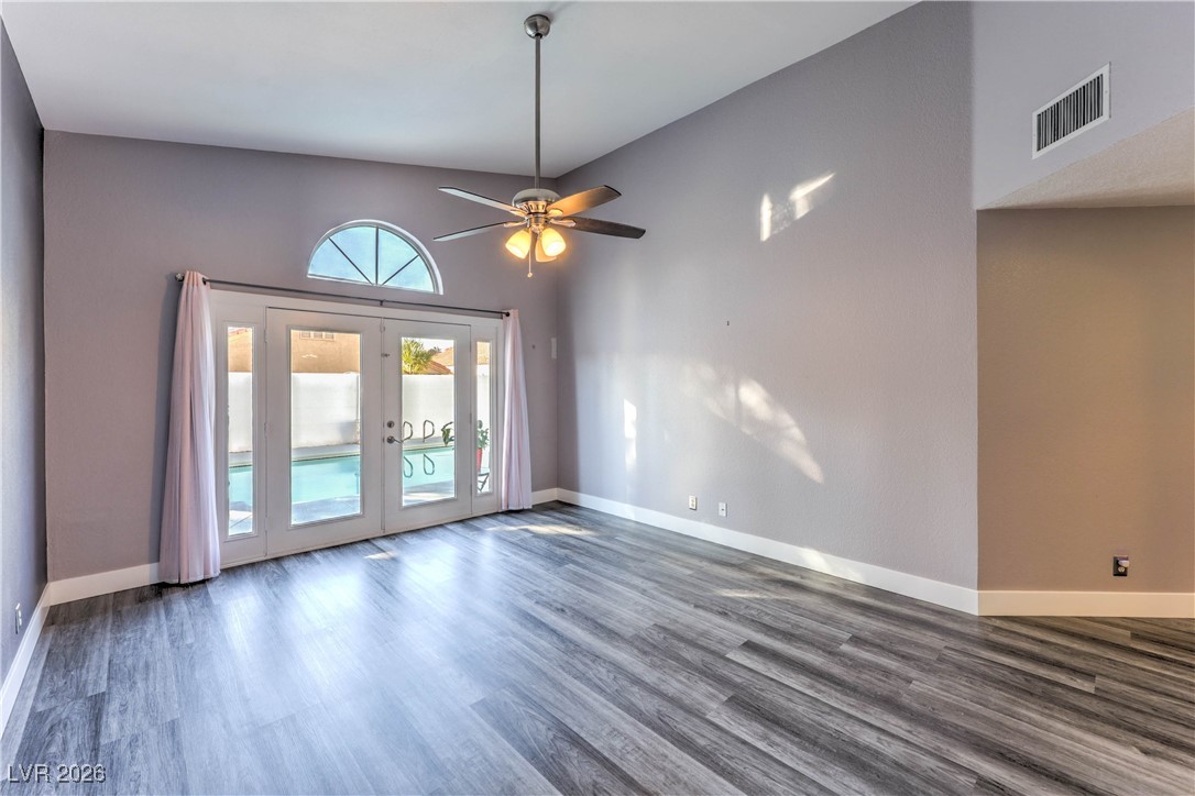 9405 Crosspointe Avenue Las Vegas, NV 89117 - Photo 9 of 37 Primary Downstairs Bedroom w/ Entry to backyard