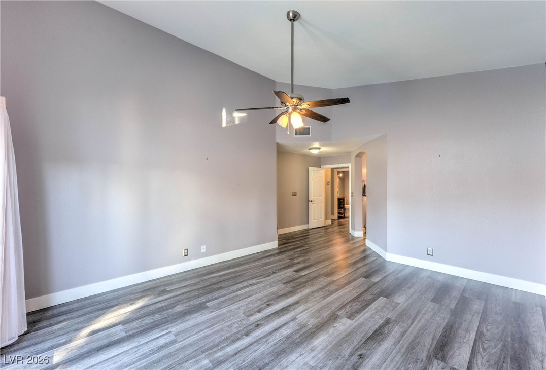 9405 Crosspointe Avenue Las Vegas, NV 89117 - Photo 10 of 37 Primary Downstairs Bedroom w/ Entry to backyard