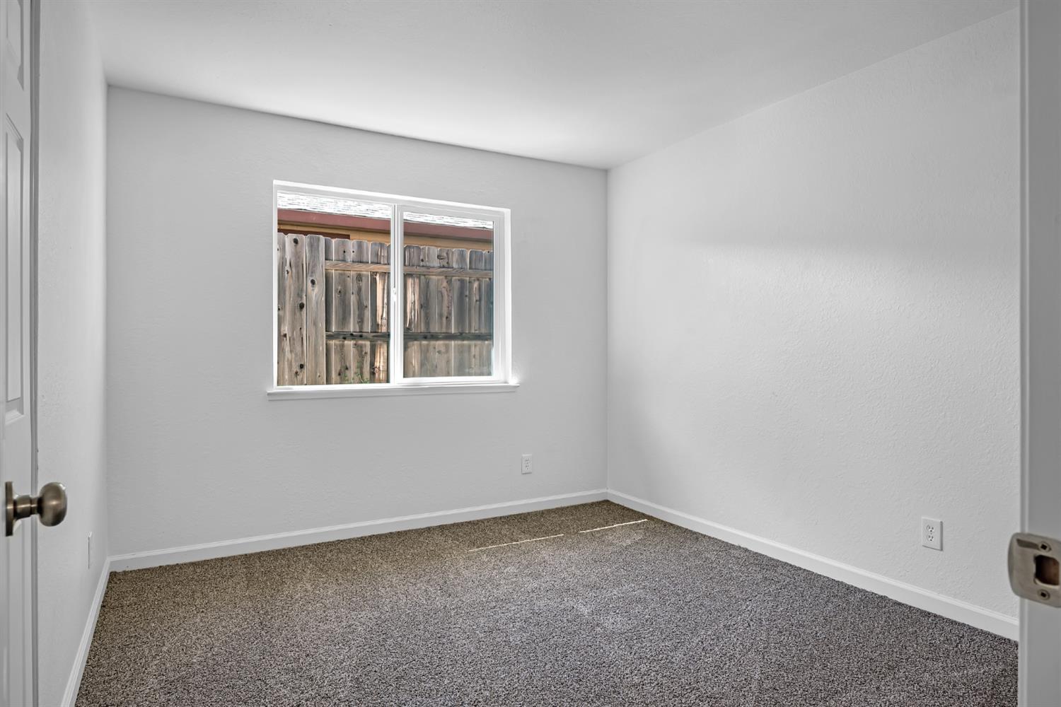 614 Brookview Court Ione, CA 95640 - Photo 11 of 24 an empty room with a window