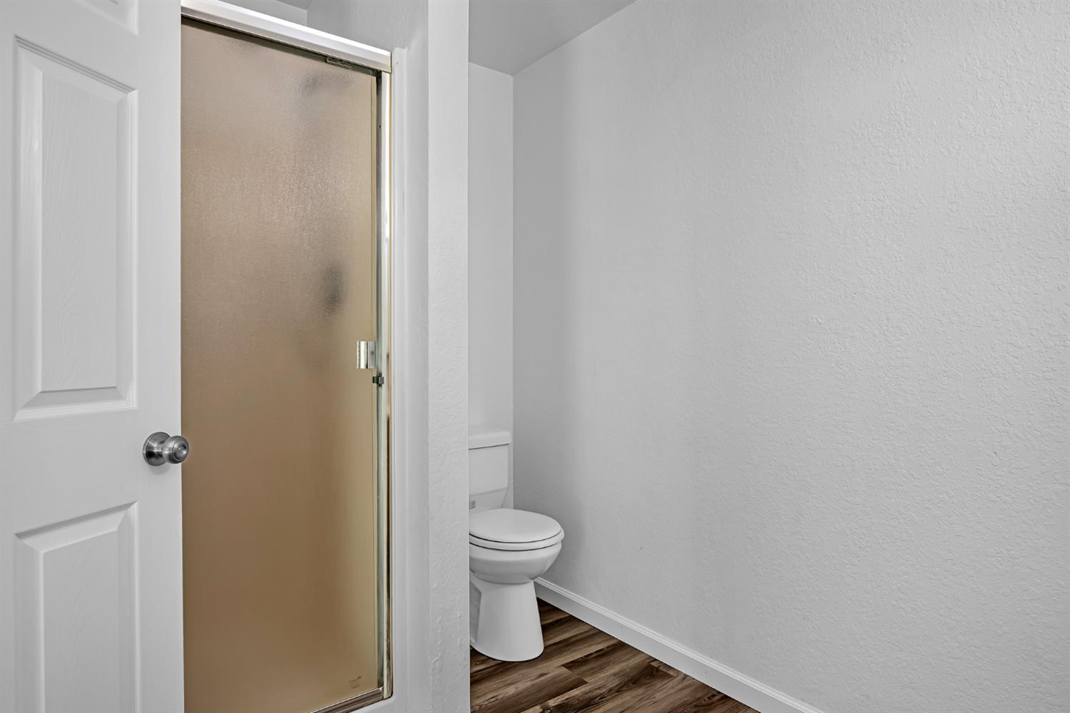 614 Brookview Court Ione, CA 95640 - Photo 17 of 24 a bathroom with a toilet and a shower