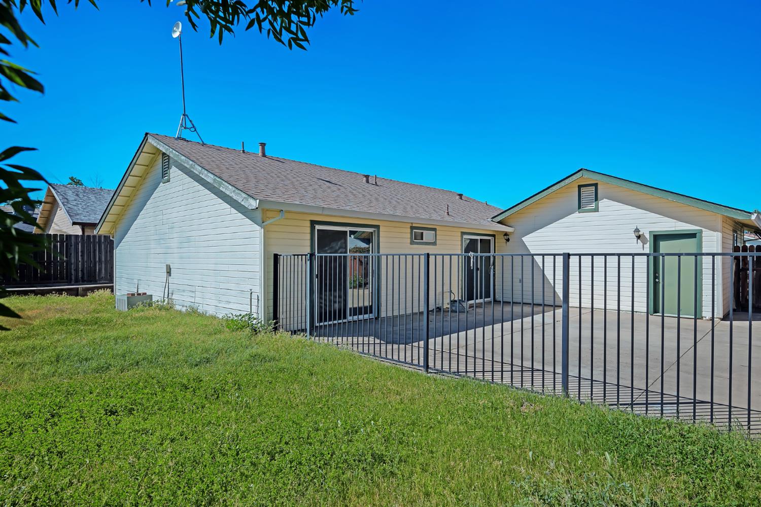 614 Brookview Court Ione, CA 95640 - Photo 23 of 24 a view of a house with a yard and deck