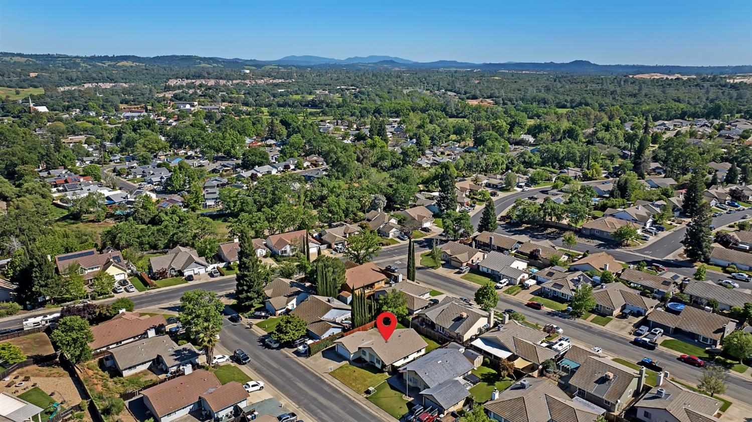 614 Brookview Court Ione, CA 95640 - Photo 24 of 24 an aerial view of green landscape with trees houses and mountain view