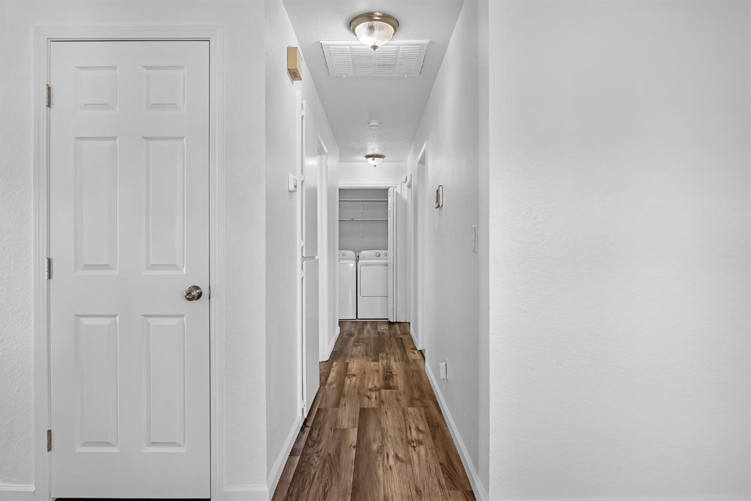 614 Brookview Court Ione, CA 95640 - Photo 9 of 24 a view of a hallway with a livingroom