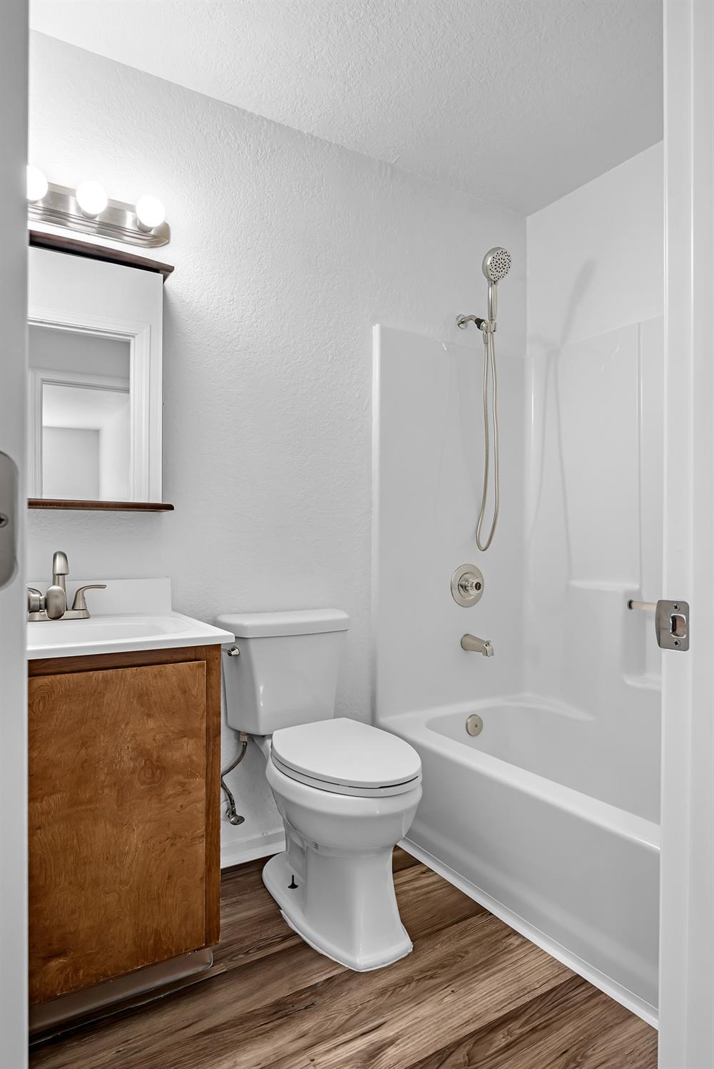614 Brookview Court Ione, CA 95640 - Photo 10 of 24 a bathroom with a sink toilet and shower