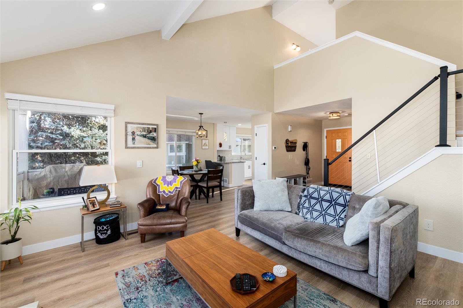 4010 South Rifle Way Aurora, CO 80013 - Photo 15 of 45 a living room with furniture and a table