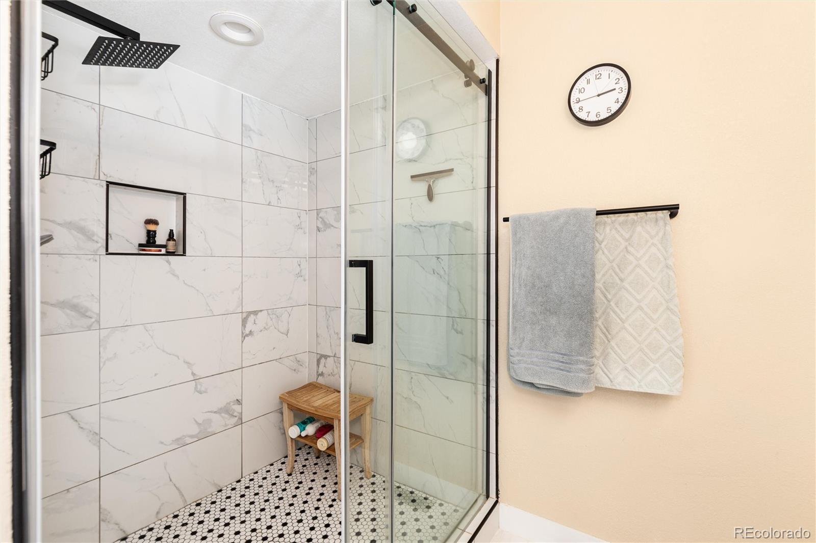 4010 South Rifle Way Aurora, CO 80013 - Photo 27 of 45 a bathroom with a shower