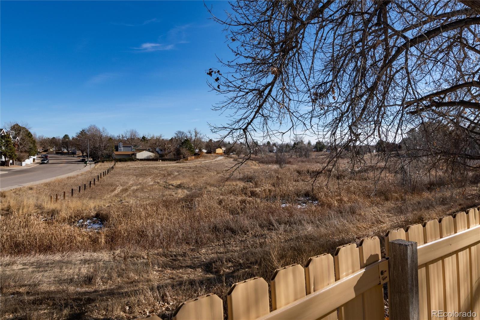 4010 South Rifle Way Aurora, CO 80013 - Photo 45 of 45 a view of a dry yard with wooden fence