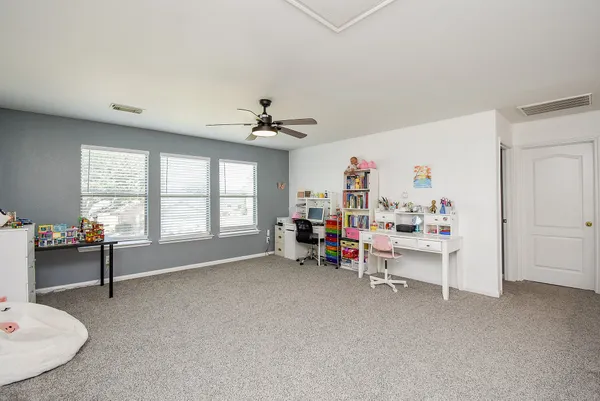 a view of livingroom with furniture and a window