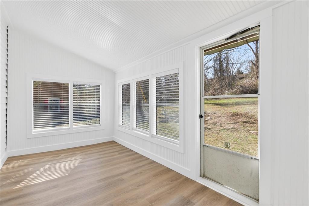 246 Spring Street Commerce, GA 30529 - Photo 20 of 23 a view of an empty room with a window