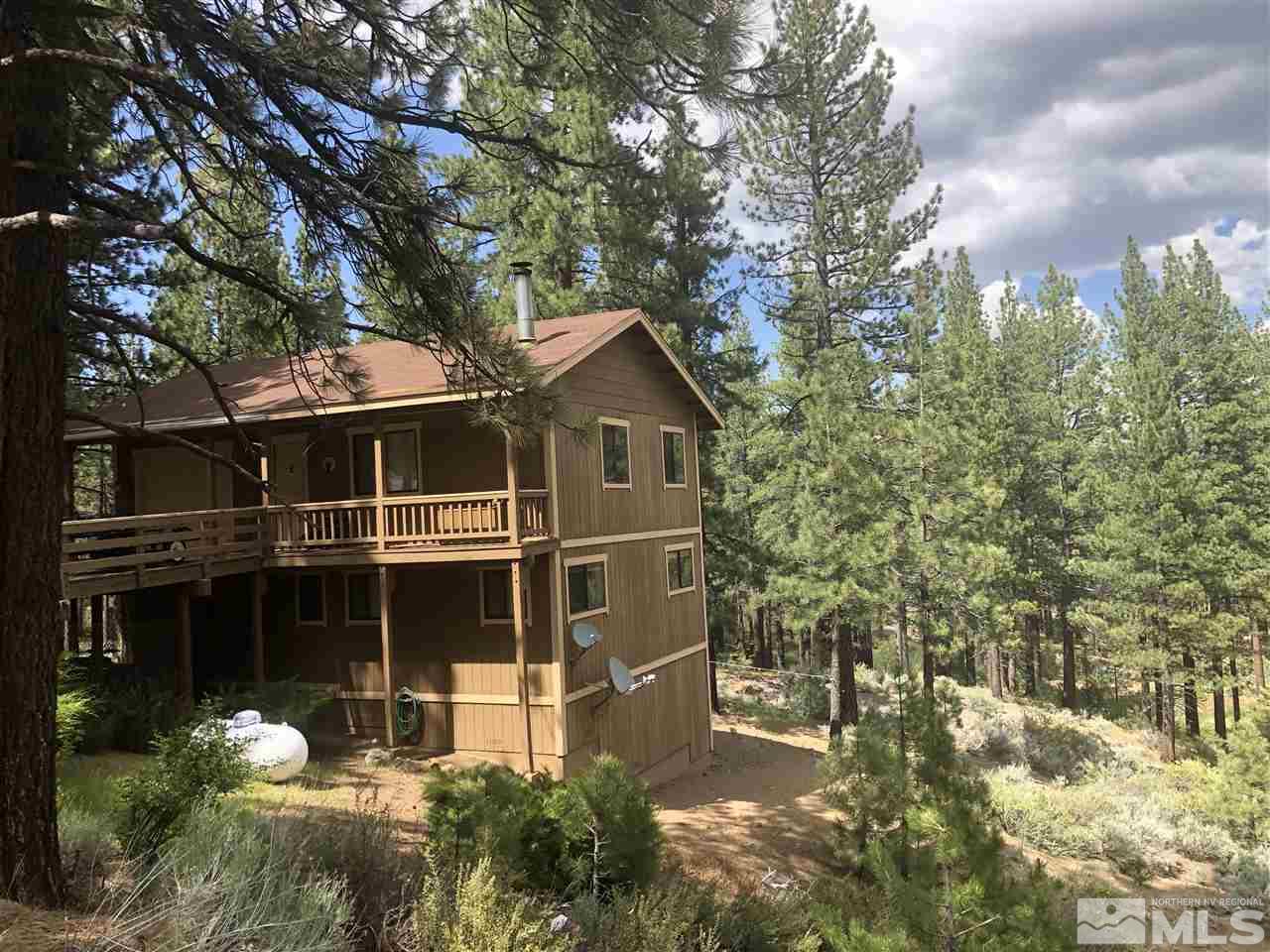 60 Lava Cap Markleeville, CA 96120 - Photo 1 of 20 a front view of a house with a garden