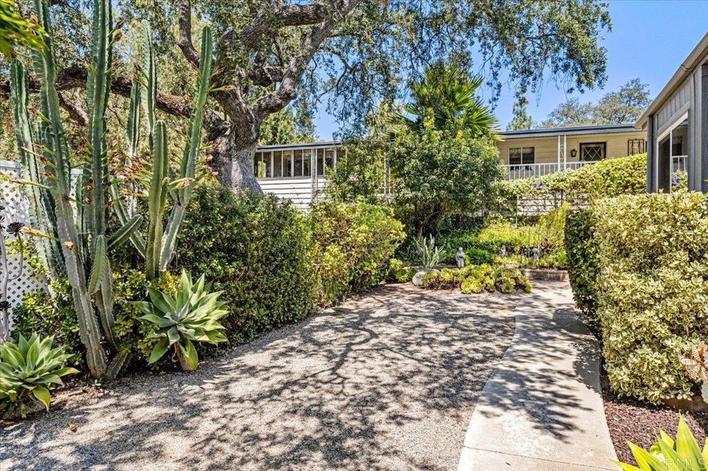 18218 Paradise Mountain Road, Unit 116 Valley Center, CA 92082 - Photo 24 of 35 a view of a garden with plants