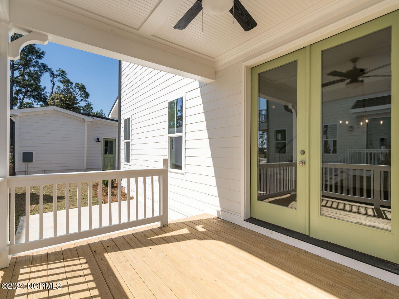 331 Braden Road Southern Pines, NC 28387 - Photo 16 of 29 018-1280x960-side-porch-off-dining