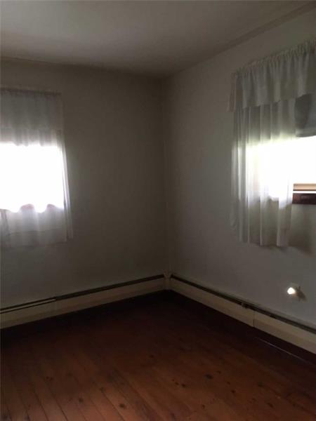 60 Superior Road Tarentum, PA 15084 - Photo 5 of 9 MASTER BEDROOM WITH POLISHED PINE FLOORS.