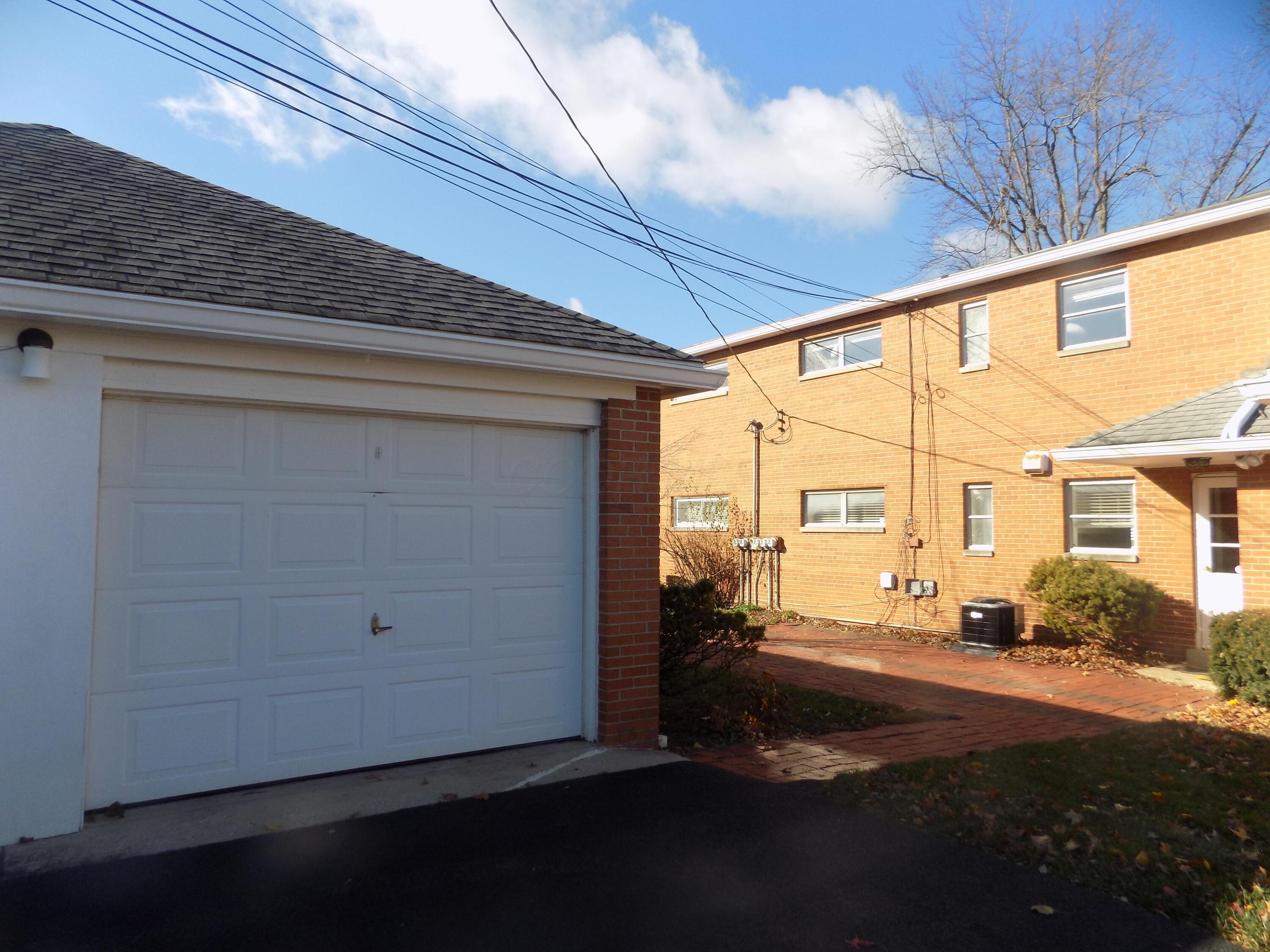 1743 Ardleigh Road Columbus, OH 43221 - Photo 27 of 29 There is a 2 car garage which is shared with another condo. It is a block garage and its very large. The garage door on the right belongs to this condo.