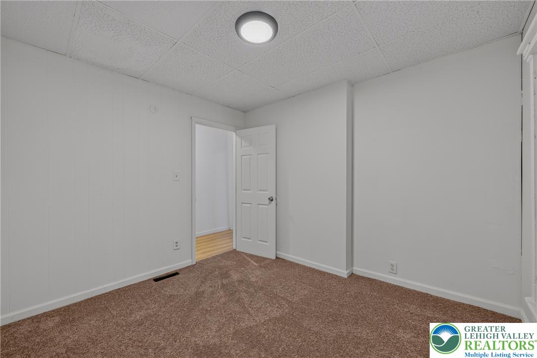 313 Main Street Slatington, PA 18080 - Photo 23 of 73 A well-lit bedroom provides a comfortable and private retreat.