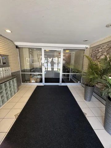 a living room with large windows