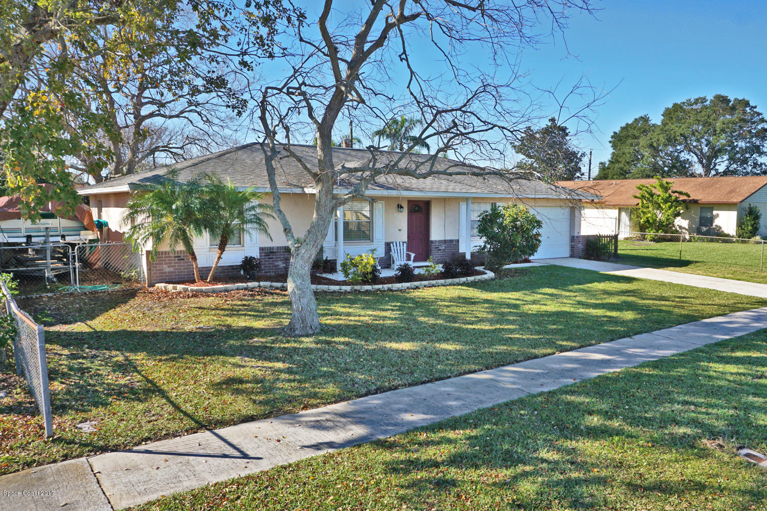 897 Levitt Parkway Rockledge, FL 32955 - Photo 24 of 34 Frontyard Corner View 2