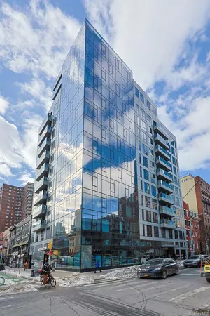 a city street view with tall buildings