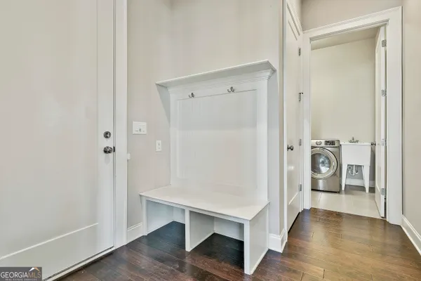 a bathroom with a glass shower door and a glass door shower