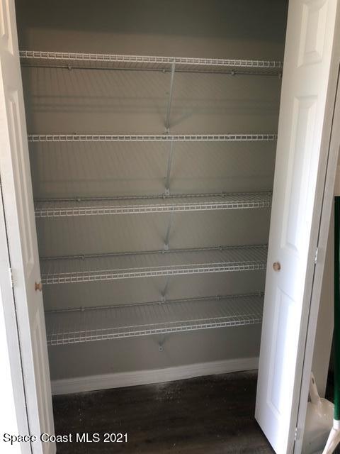 5401 Flint Road Cocoa, FL 32927 - Photo 5 of 13 a view of small space with racks on the wall