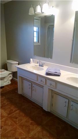 1120 Blake Road Lyles, TN 37098 - Photo 11 of 20 2nd Full Bath on Main Level ~Double vanity ~ Storage nook ~ Very open & spacious