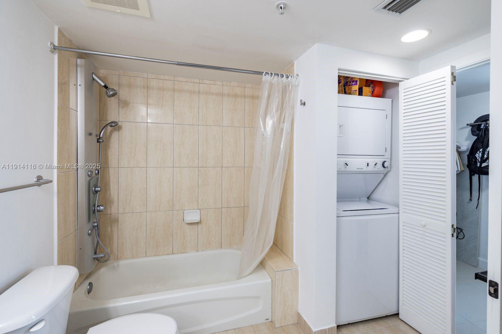 1750 North Bayshore Drive, Unit 4312 Miami, FL 33132 - Photo 8 of 10 a bathroom with a shower and a toilet